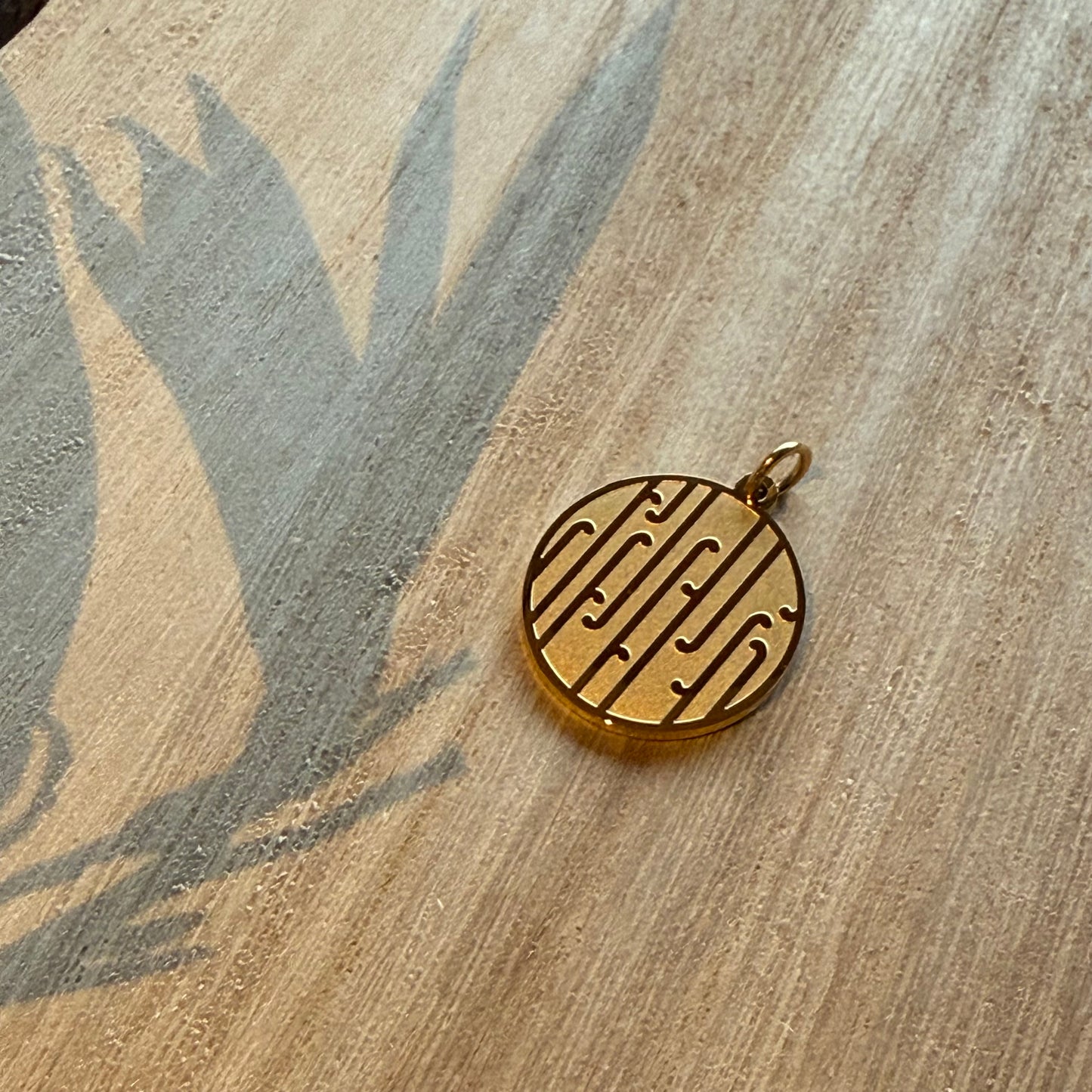 Tuku Iho Charm