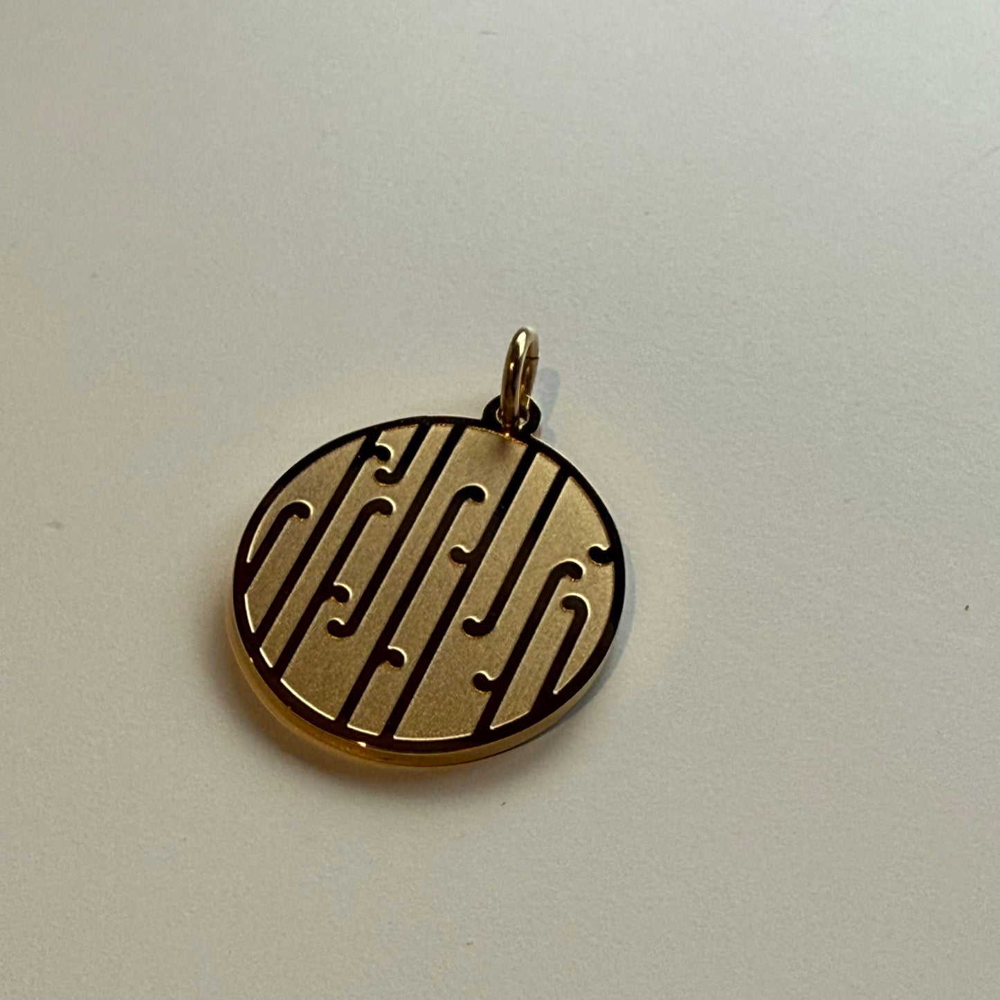 Tuku Iho Charm